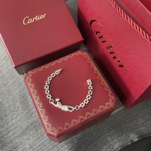 Cartier Panther 18K Gold Diamond Bracelet with Emerald Eyes - Image 6