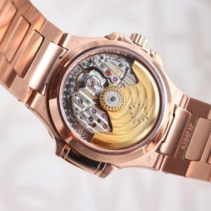 Patek Philippe Nautilus Ladies Watch with Cognac Tsavorite Jewelry Design - Image 10